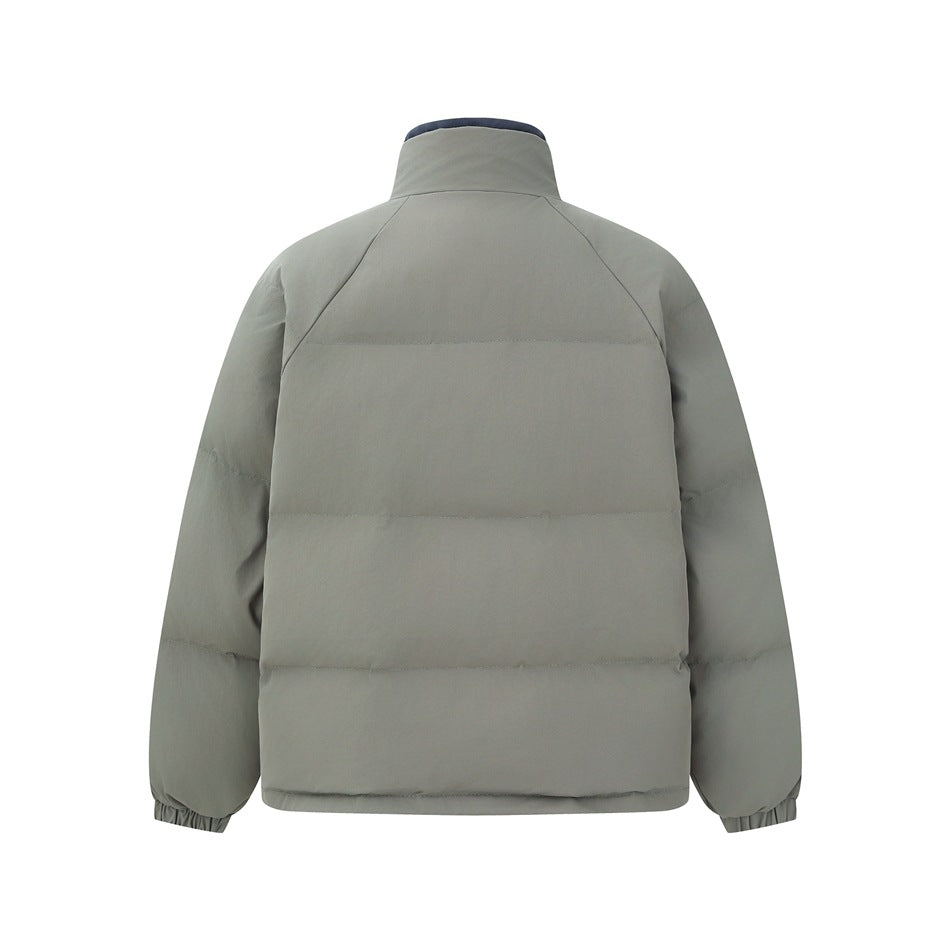 Back view of a sage green padded jacket with horizontal quilting and a high collar.