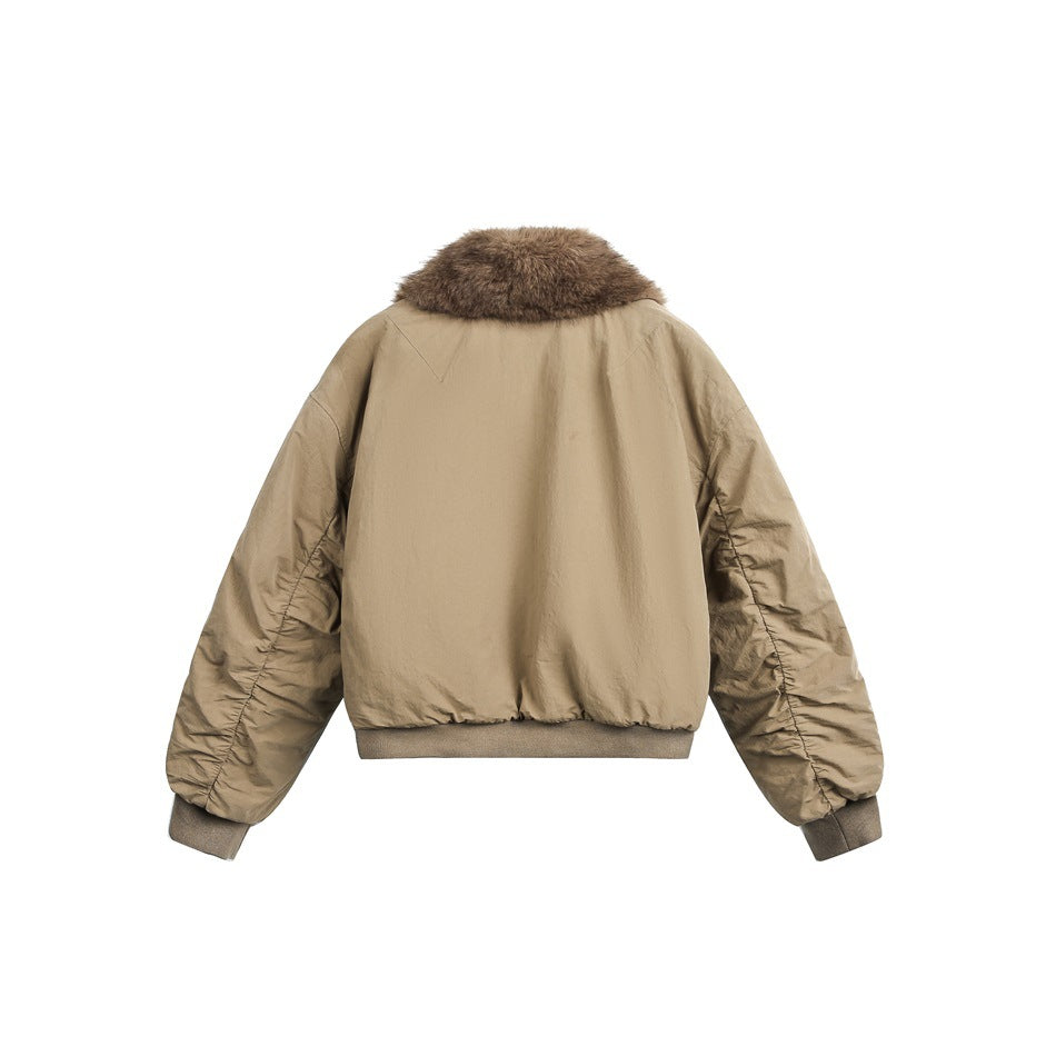 Back view of a tan bomber jacket with a plush brown collar and ribbed cuffs and hem, shown on a white background.
