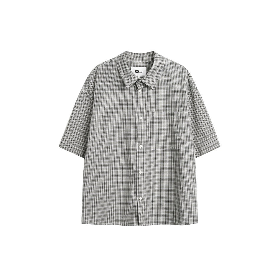 Gray and white check short-sleeve button-up shirt with chest pocket, flat front view on white background