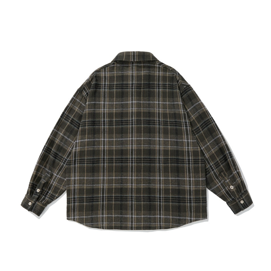 Back view of brown plaid long-sleeve shirt showing continuous check pattern and buttoned cuffs