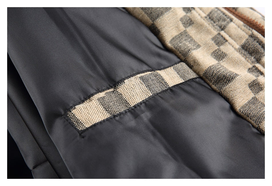 Close-up of the jacket's dark lining and a check-patterned interior trim strip.