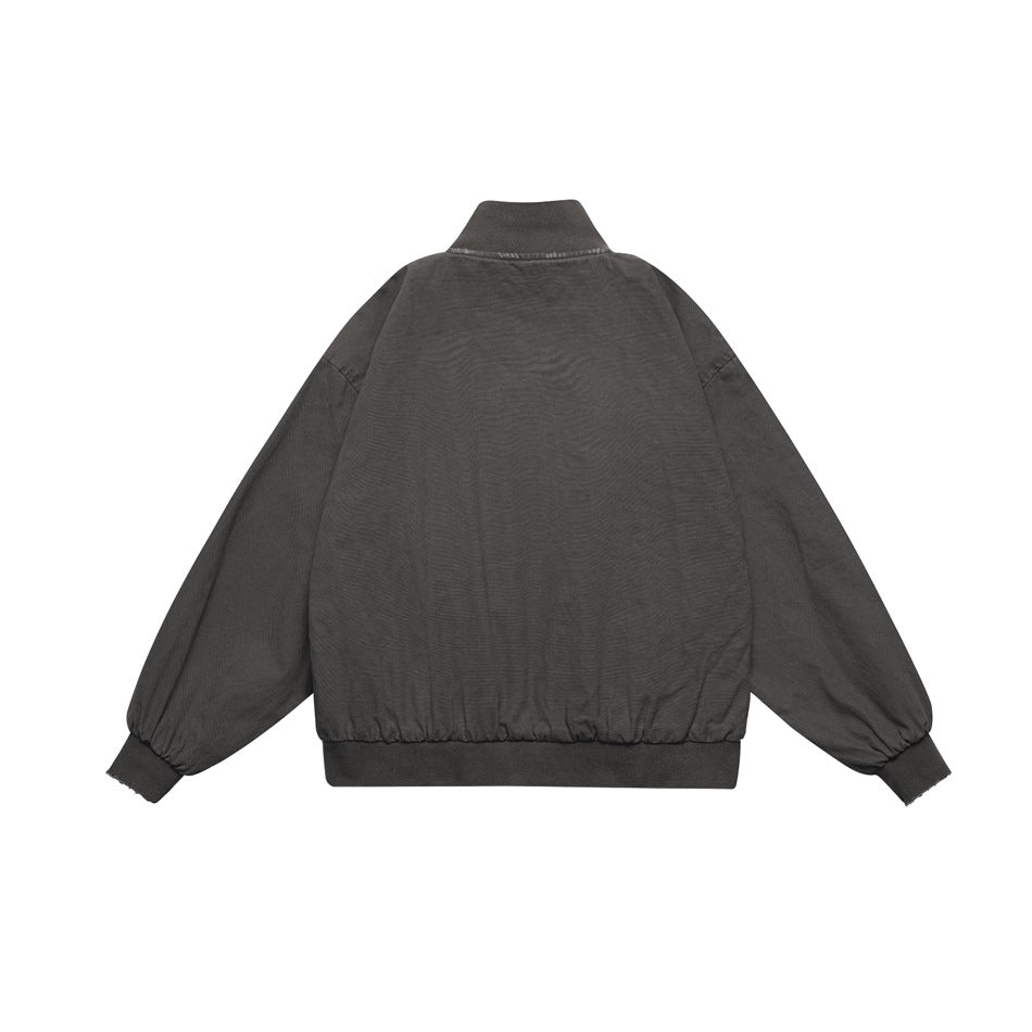 Back view of a charcoal zip jacket with a stand collar, gathered sleeves, and ribbed cuffs and hem.
