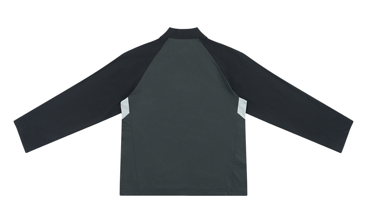 Back view of a dark charcoal long-sleeve pullover with a high collar and light gray side inserts.
