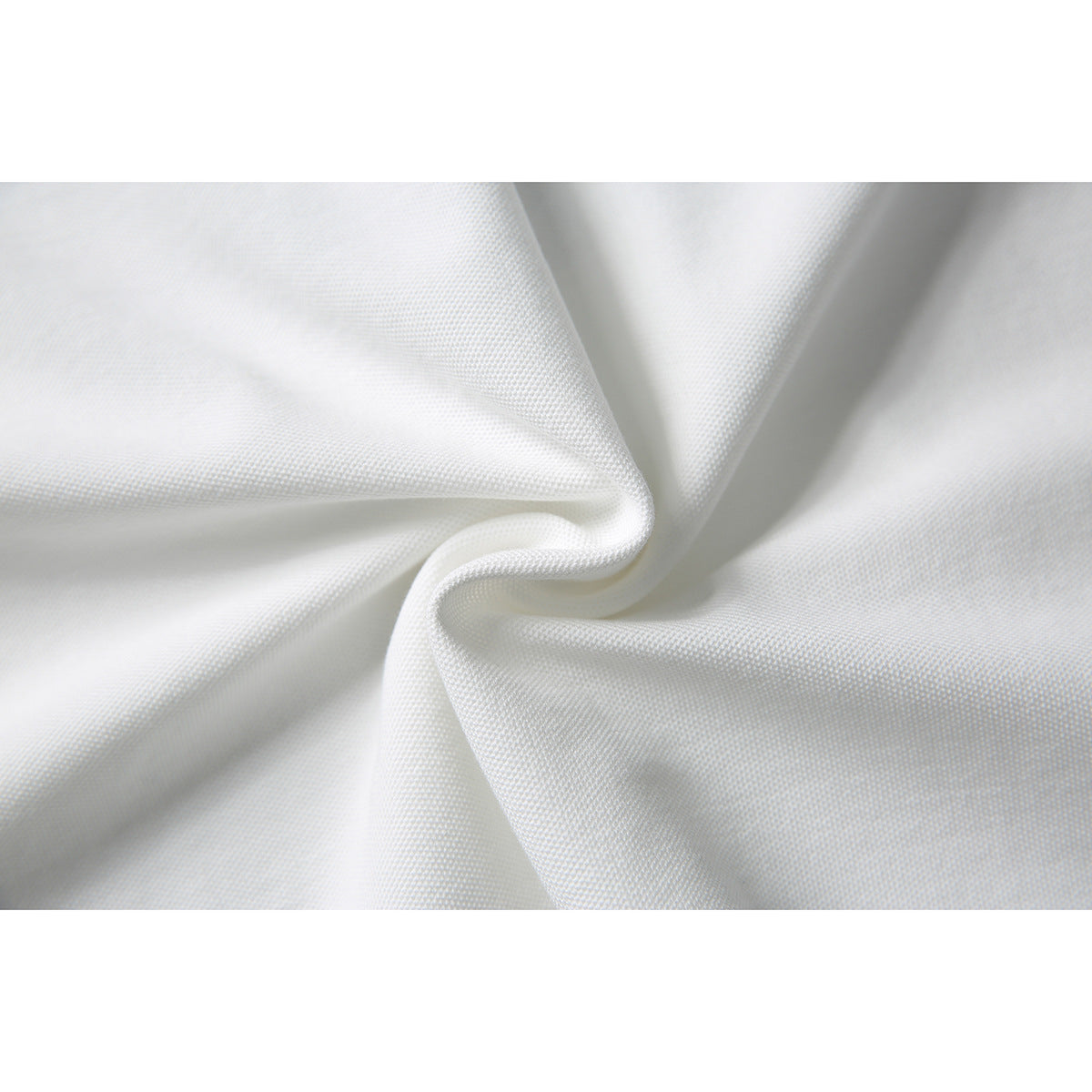 Close-up showing the textured white fabric gathered into soft folds.