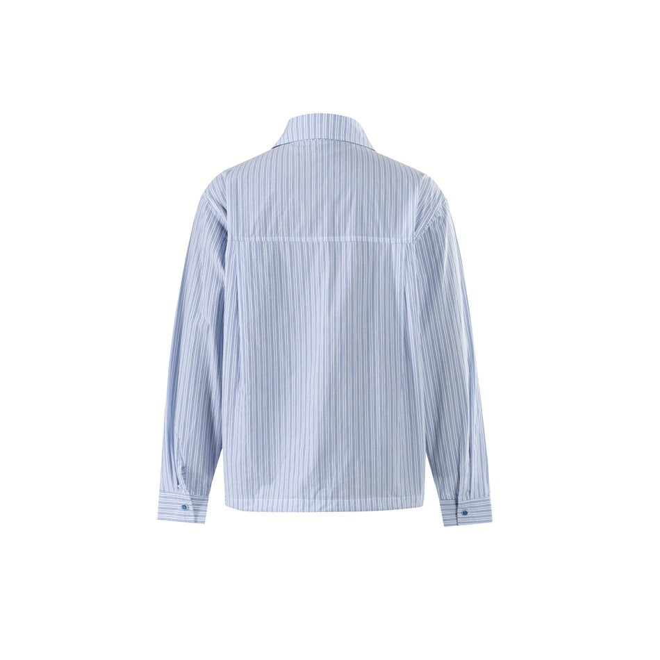 Back view of blue and white striped long-sleeve shirt with yoke seam and buttoned cuffs on white background