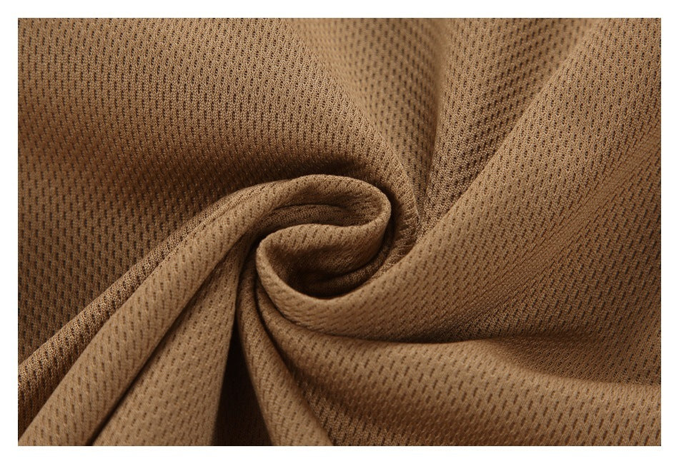 Close-up of brown fabric gathered into folds, showing a small textured knit pattern.