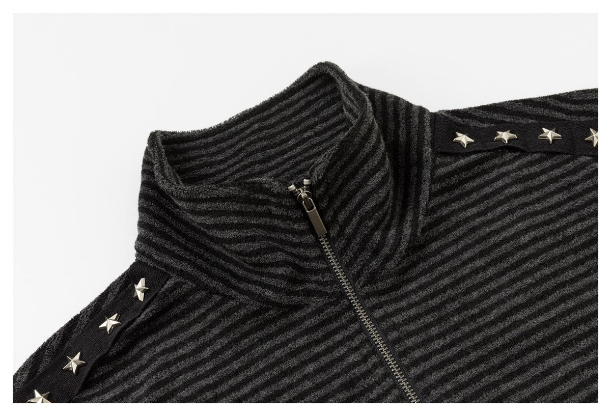 Close-up of the striped jacket's stand collar, metal zipper, and silver star studs on black shoulder trim.