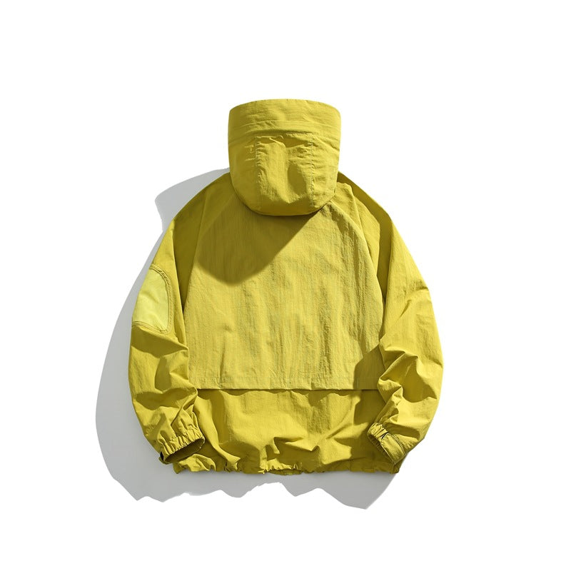 Bright yellow hooded pullover jacket shown from the back, with elastic cuffs and hem.