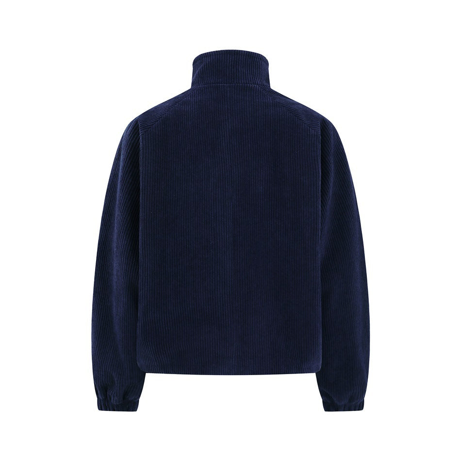 Back view of a navy ribbed zip jacket with a high collar and elastic cuffs.