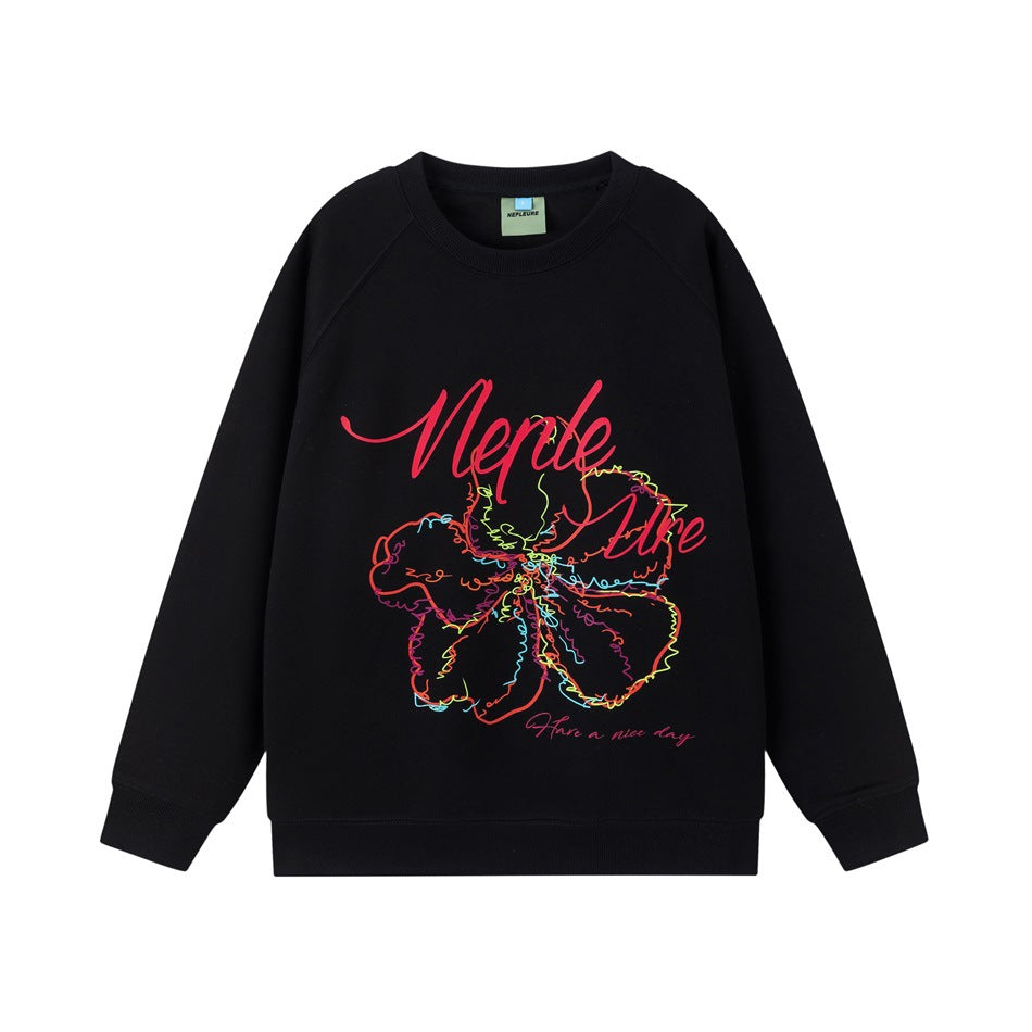 Black crew neck raglan sweatshirt with multicolor line-art flower and red script print, flat front view