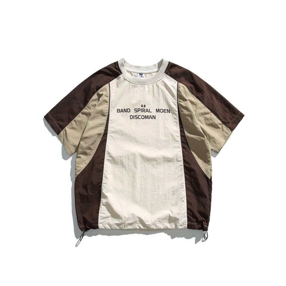 Brown and beige color-block short-sleeve tee with chest print and drawstring hem, flat lay front view