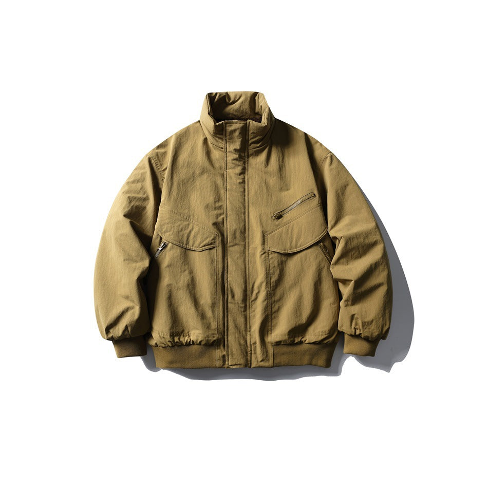 Yellow-khaki bomber-style jacket with stand collar, flap pockets, zip chest pocket and ribbed cuffs and hem, front view