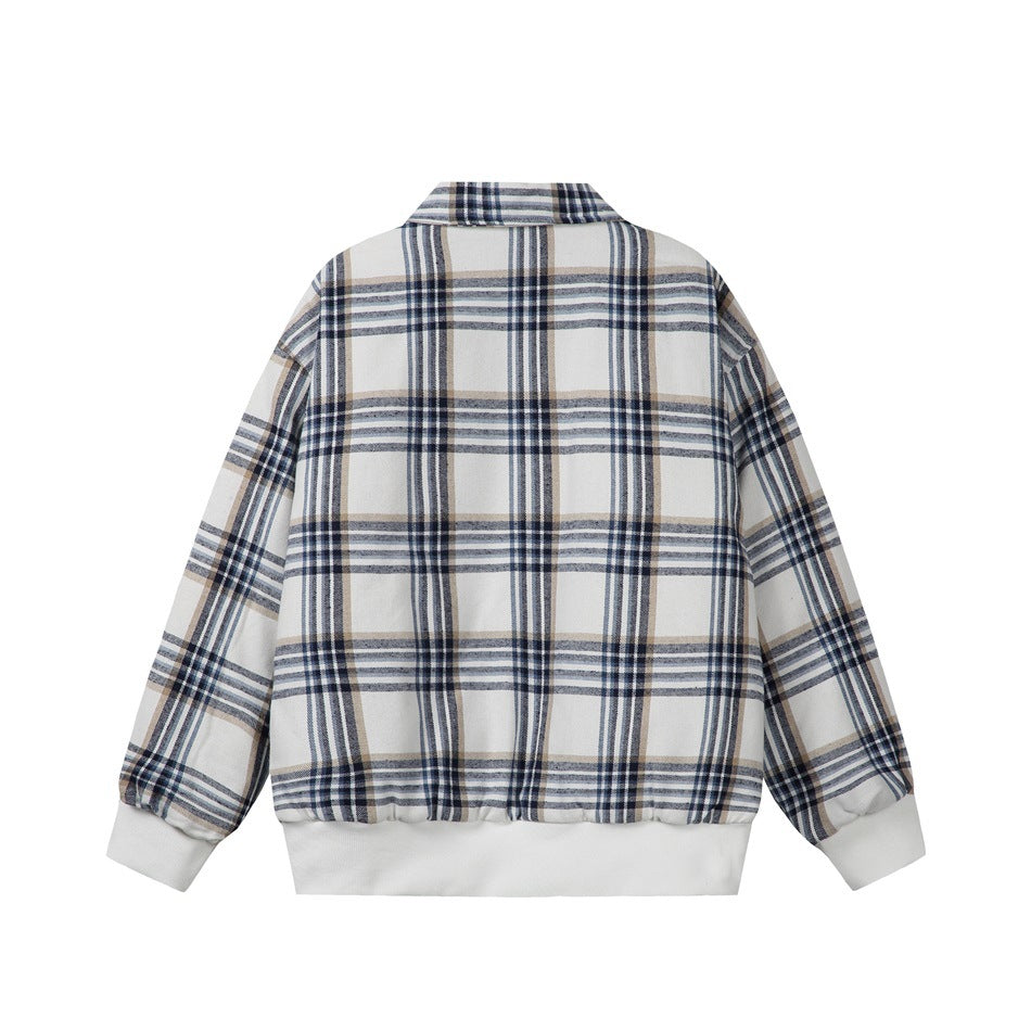 Back view of a cream jacket with navy and tan plaid, a collar, and white ribbed hem and cuffs.