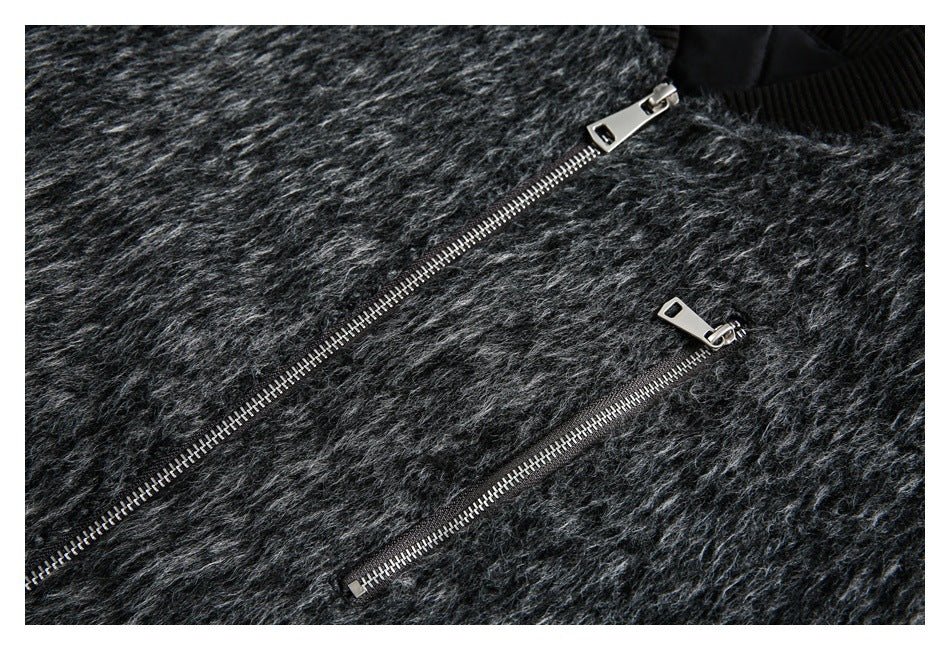 Close-up showing two silver zippers on the charcoal gray fuzzy jacket.