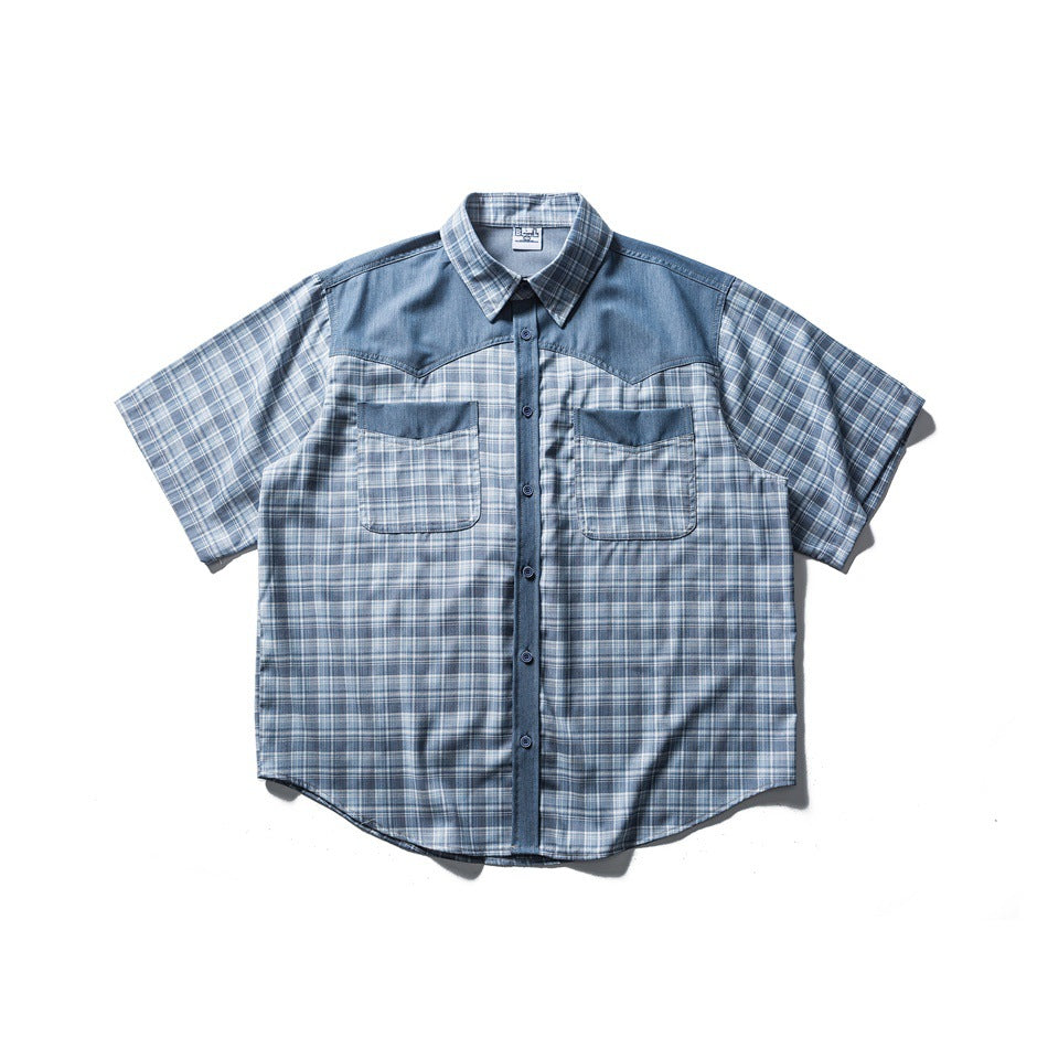 Blue plaid short-sleeve button-front shirt with denim-look yoke and two chest pockets, flat lay front view