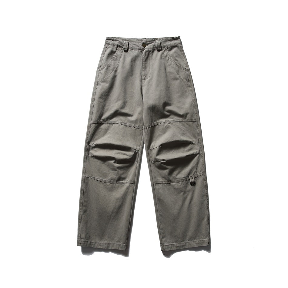 Light khaki wide-leg work pants, flat front view with knee seams, pleats and slanted pockets