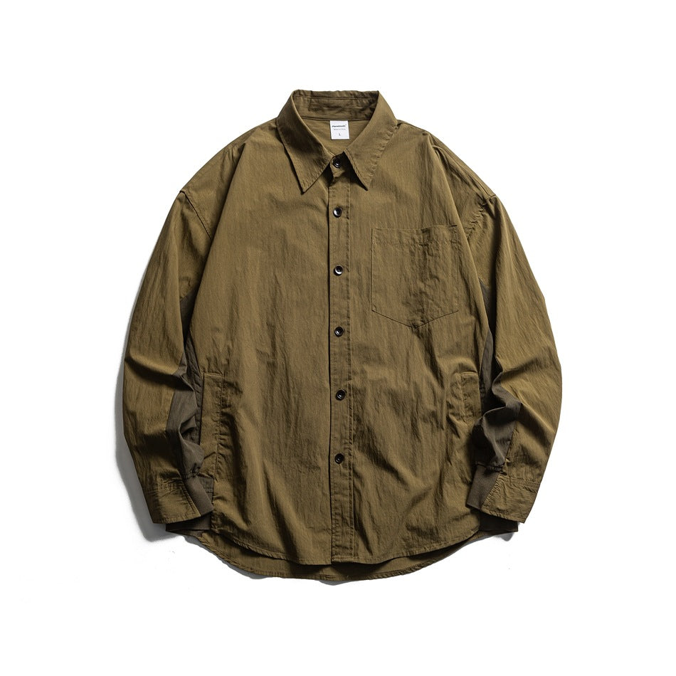 Olive green long-sleeve button-up shirt with chest pocket and darker side panels, flat lay front view