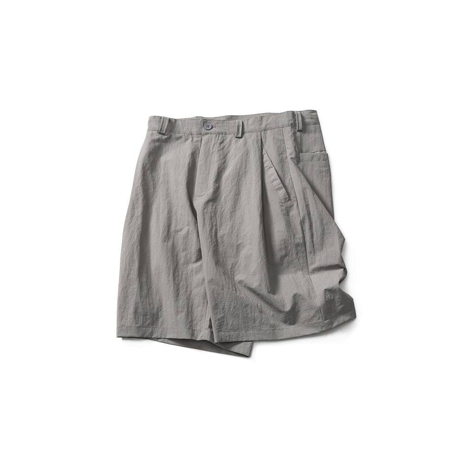 Gray tailored shorts shown flat against a white background, with a button waist, belt loops, pleats, and side pockets.