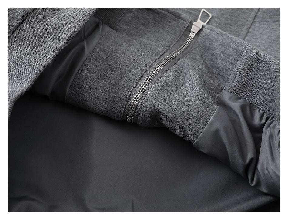Close-up showing the jacket's gray zipper and dark lining inside.