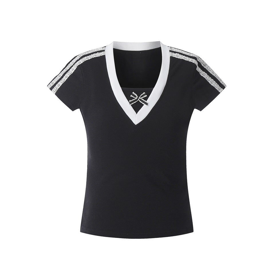 Black short-sleeve V-neck top with white neckline band, lace shoulder trim and small bow, flat front view