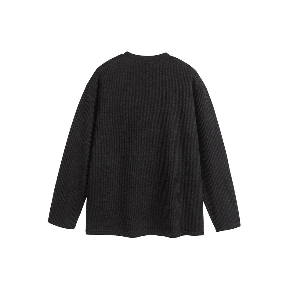 Back view of a charcoal black ribbed long-sleeve crewneck shirt.