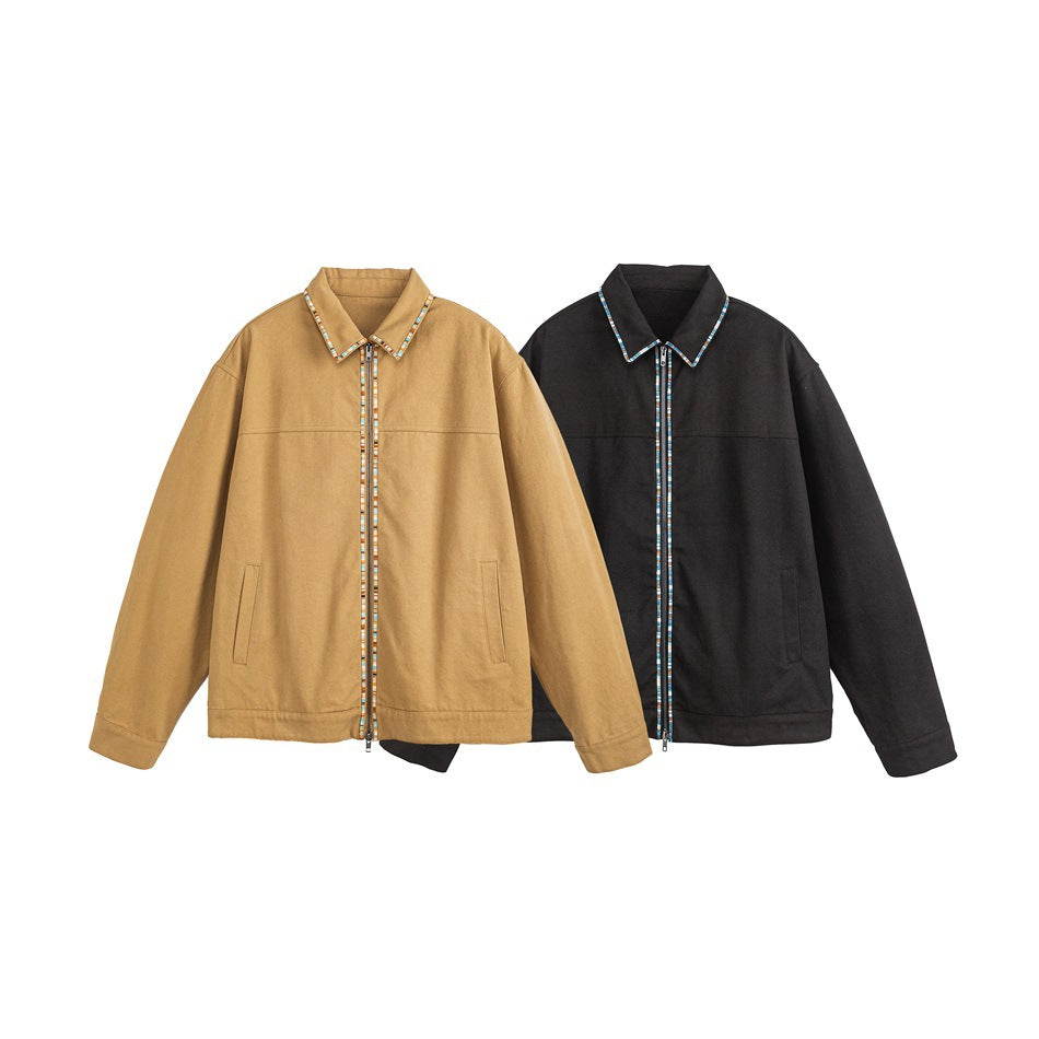 Two zip-front jackets displayed side by side in tan and black, both with multicolor trim and front pockets.