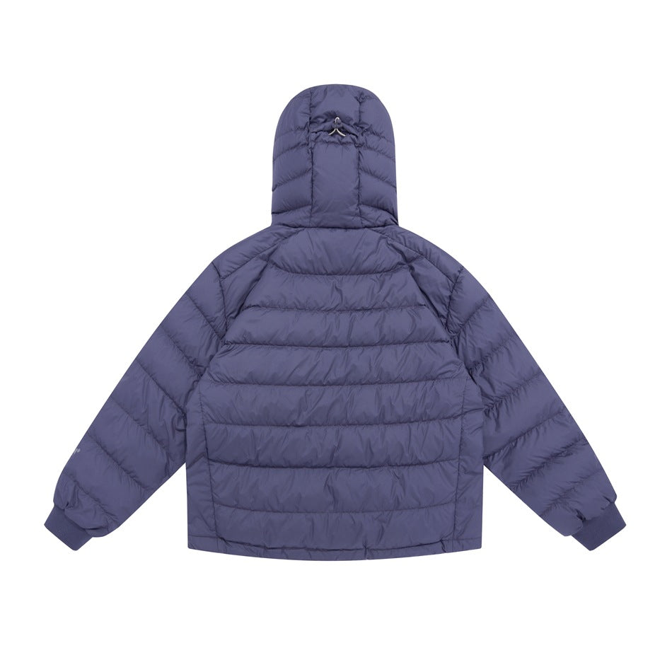 Back view of a muted blue-purple hooded quilted jacket with horizontal baffles and gathered cuffs.