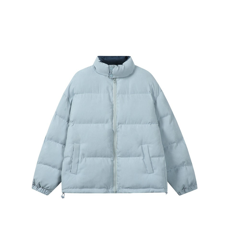 Light blue quilted puffer jacket with stand collar, front zip, pockets, elastic cuffs and hem toggles, flat view