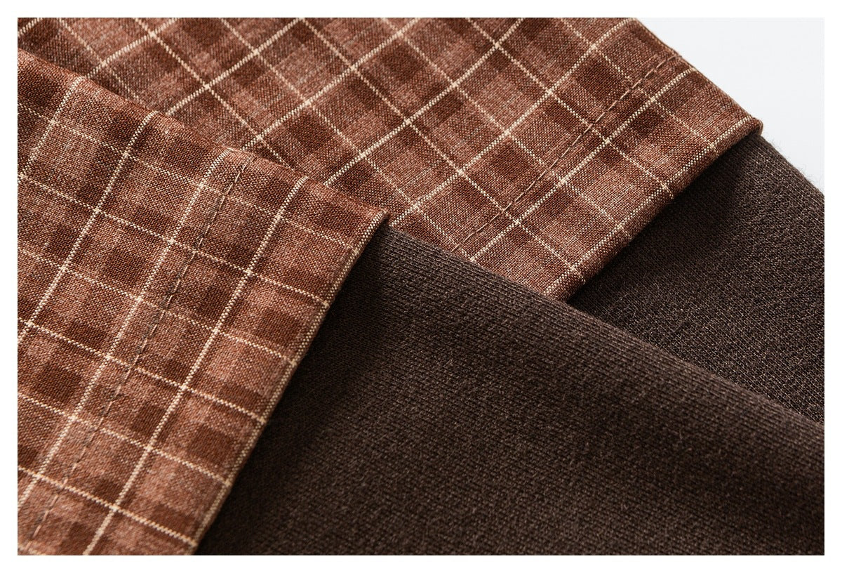 Close-up showing brown windowpane-check fabric beside a solid dark brown section.