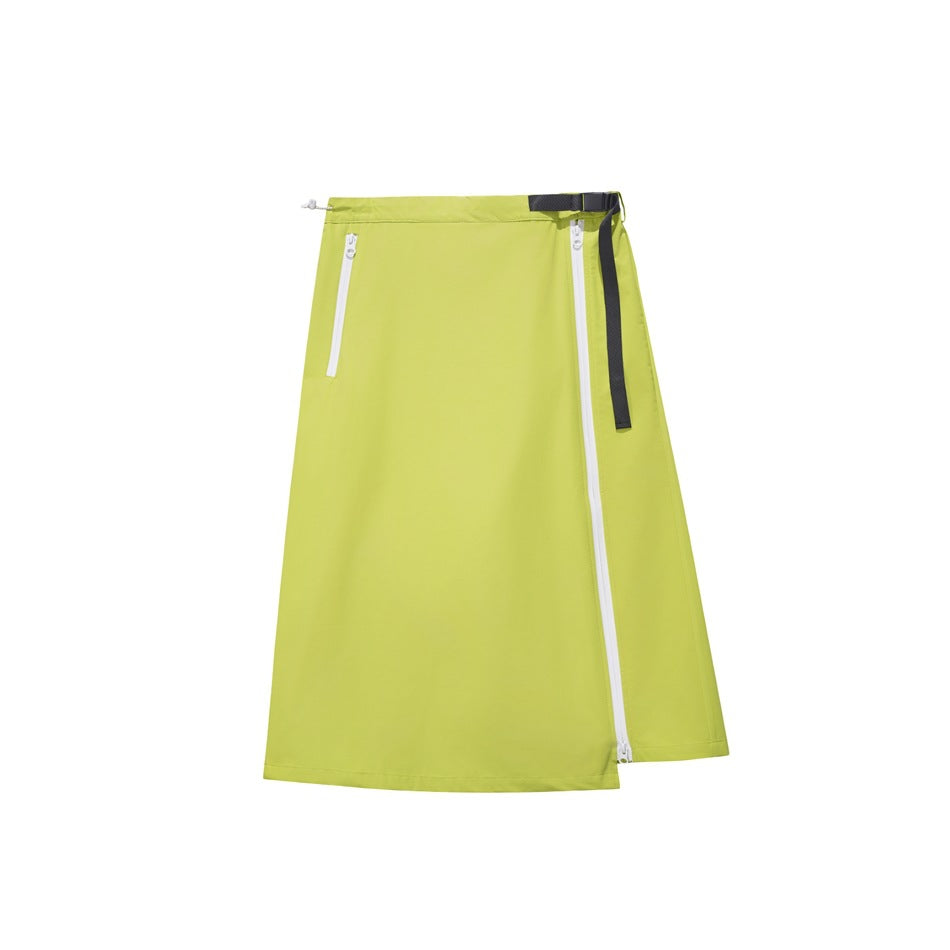 Lime green A-line wrap-style midi skirt with white zippers, drawcord toggle and black buckle strap