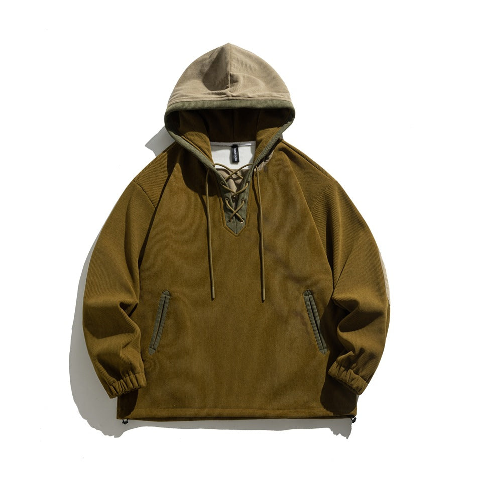 Brown ribbed hoodie with tan hood, lace-up V-neck, green-trimmed pockets and drawstring hem, flat lay