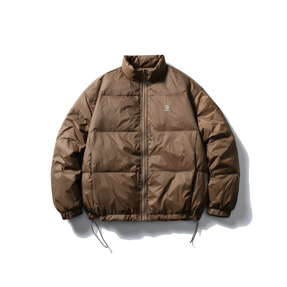 Front view of a brown quilted puffer jacket with a stand collar, full zipper, elastic cuffs, and drawcord hem.