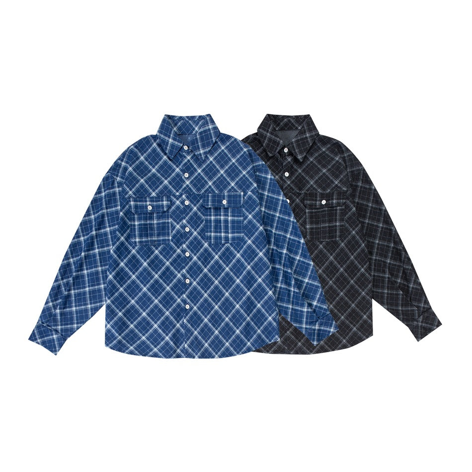 Two front-facing plaid shirts on a white background: one blue and white, one black and gray; both have two chest pockets.