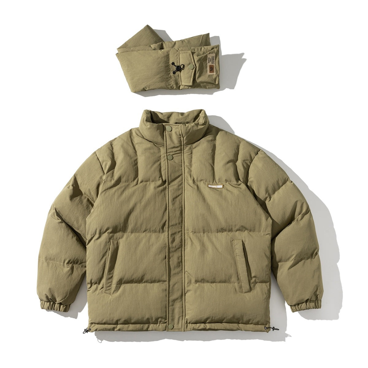 Khaki quilted stand-collar puffer jacket flat lay with a folded padded scarf above it