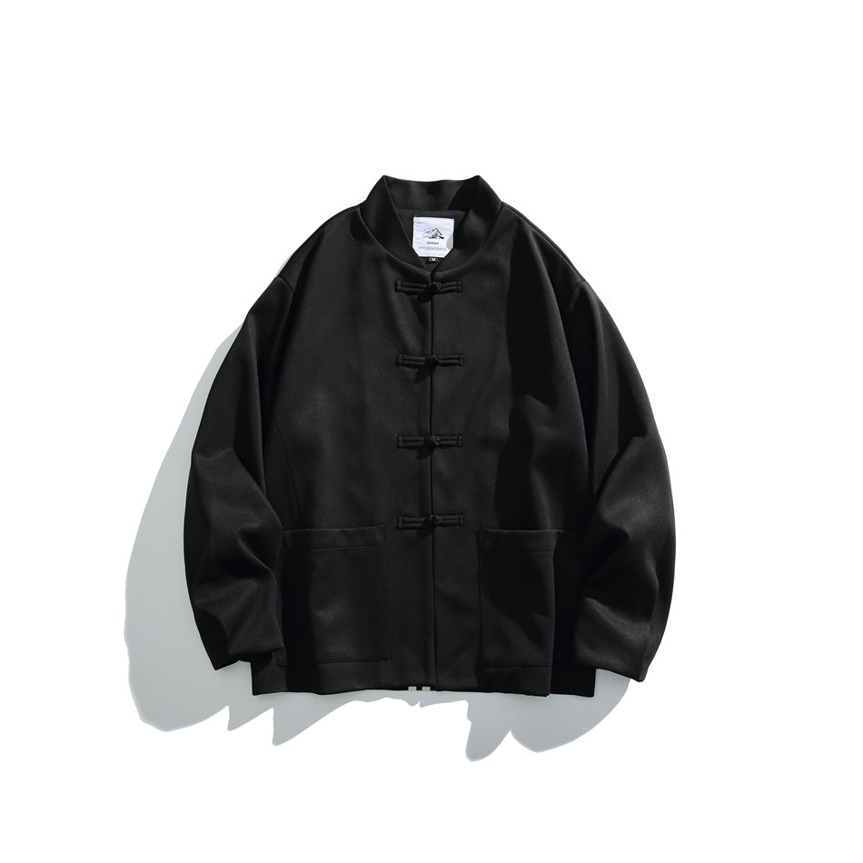 Black stand-collar jacket flat lay with four knotted frog buttons and two front patch pockets
