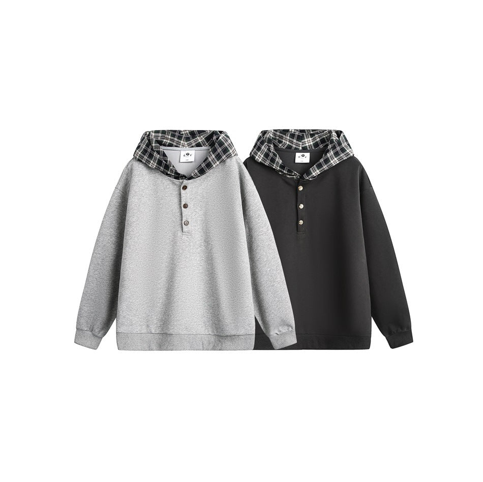 Two hooded pullovers displayed side by side in light gray and charcoal, both with plaid-lined hoods and button fronts.