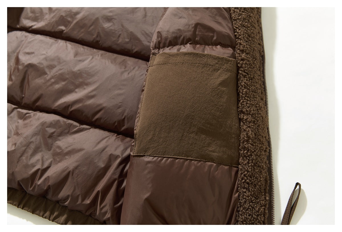 Close-up of a brown padded jacket interior with a rectangular pocket, plush trim, and zipper edge.