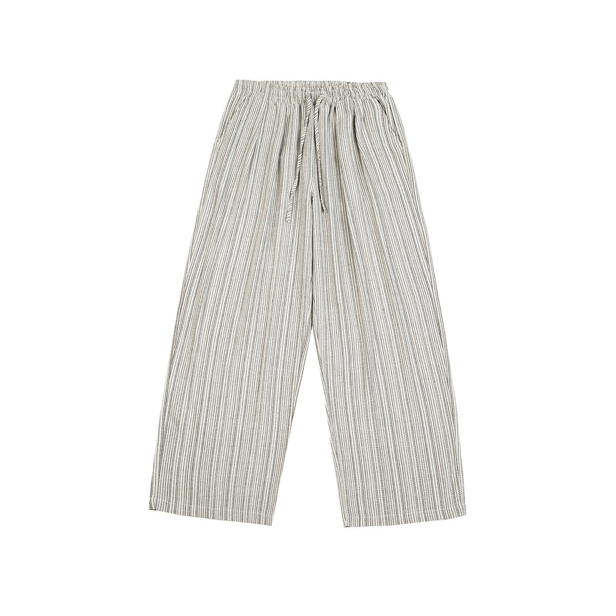 Flat lay of cream wide-leg pants with thin gray-black vertical stripes, elastic waist and drawstring