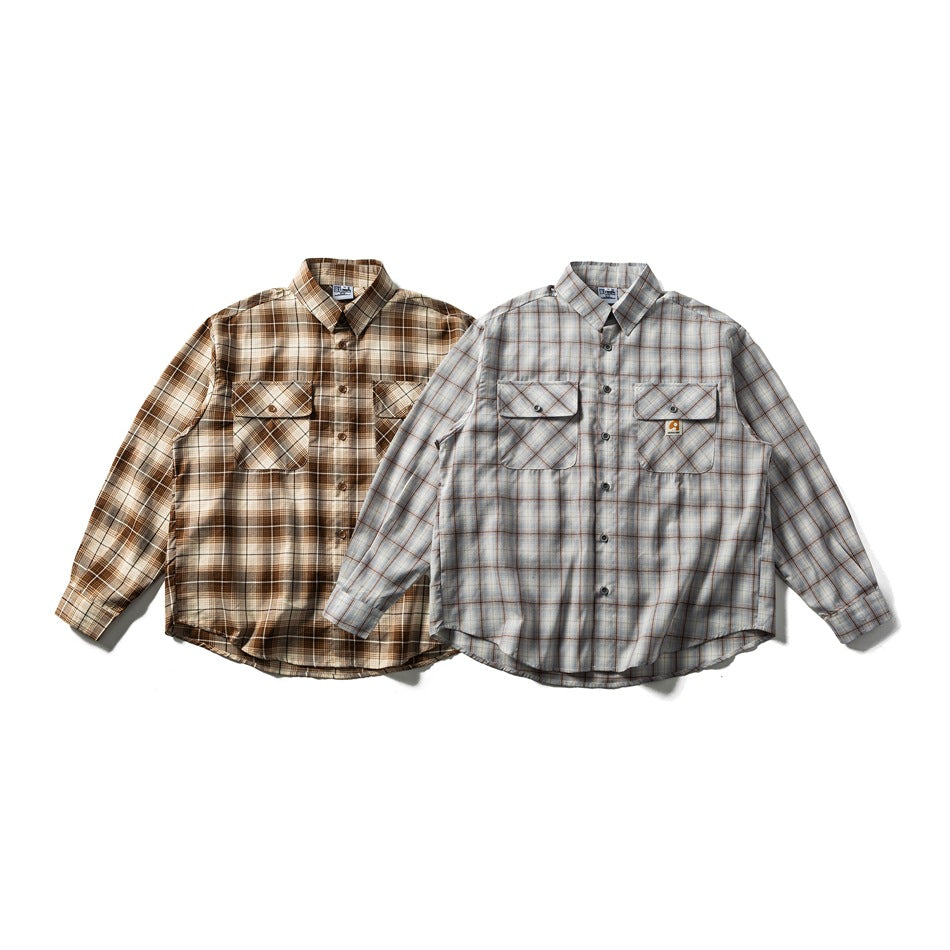 Two long-sleeve plaid button-up shirts shown from the front: one brown and cream, one light blue-gray.