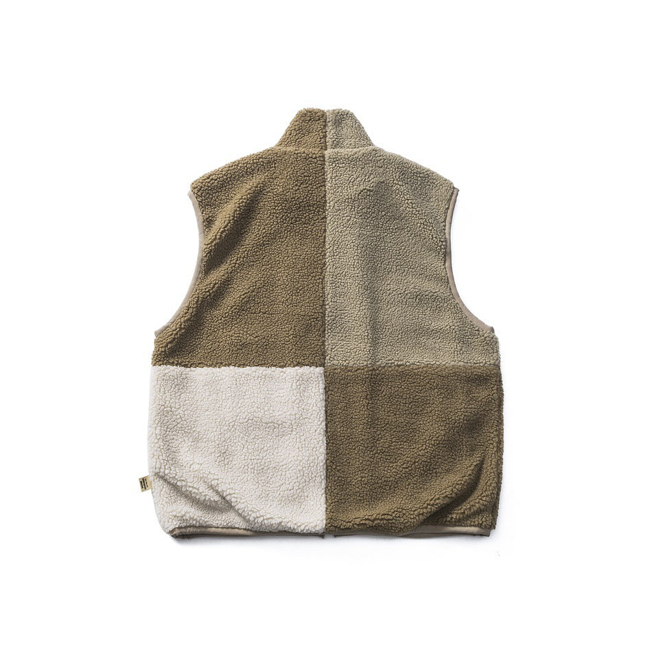 Back view of the color-block fleece-textured vest in olive, sage-gray and cream panels, flat lay