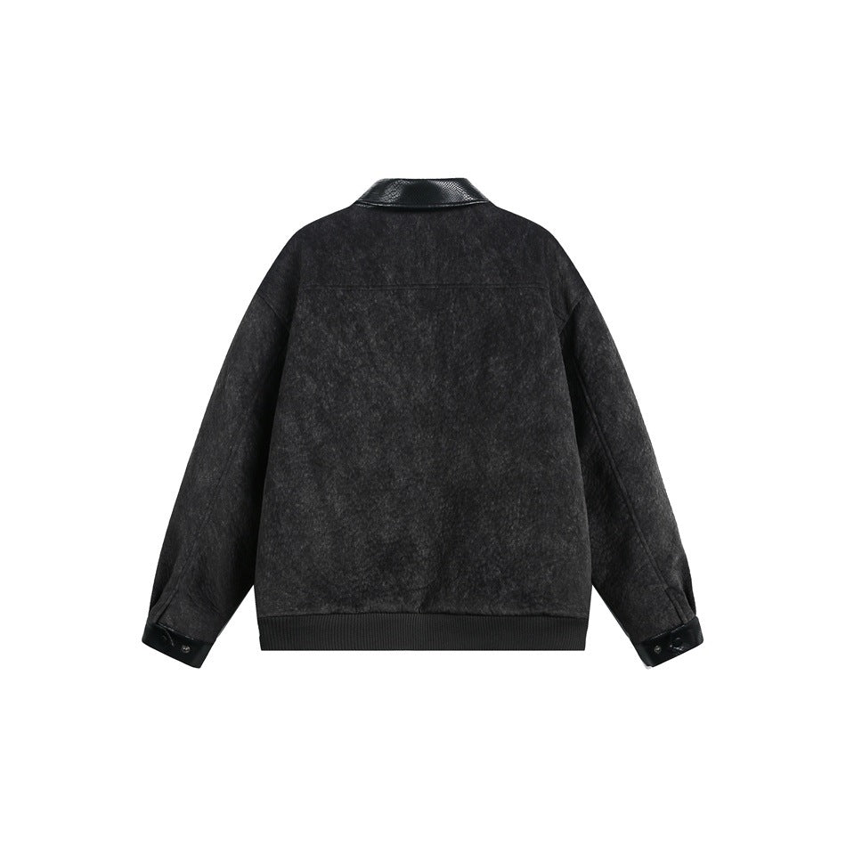 Back of a charcoal-black jacket with a black textured collar and cuffs and a ribbed hem.