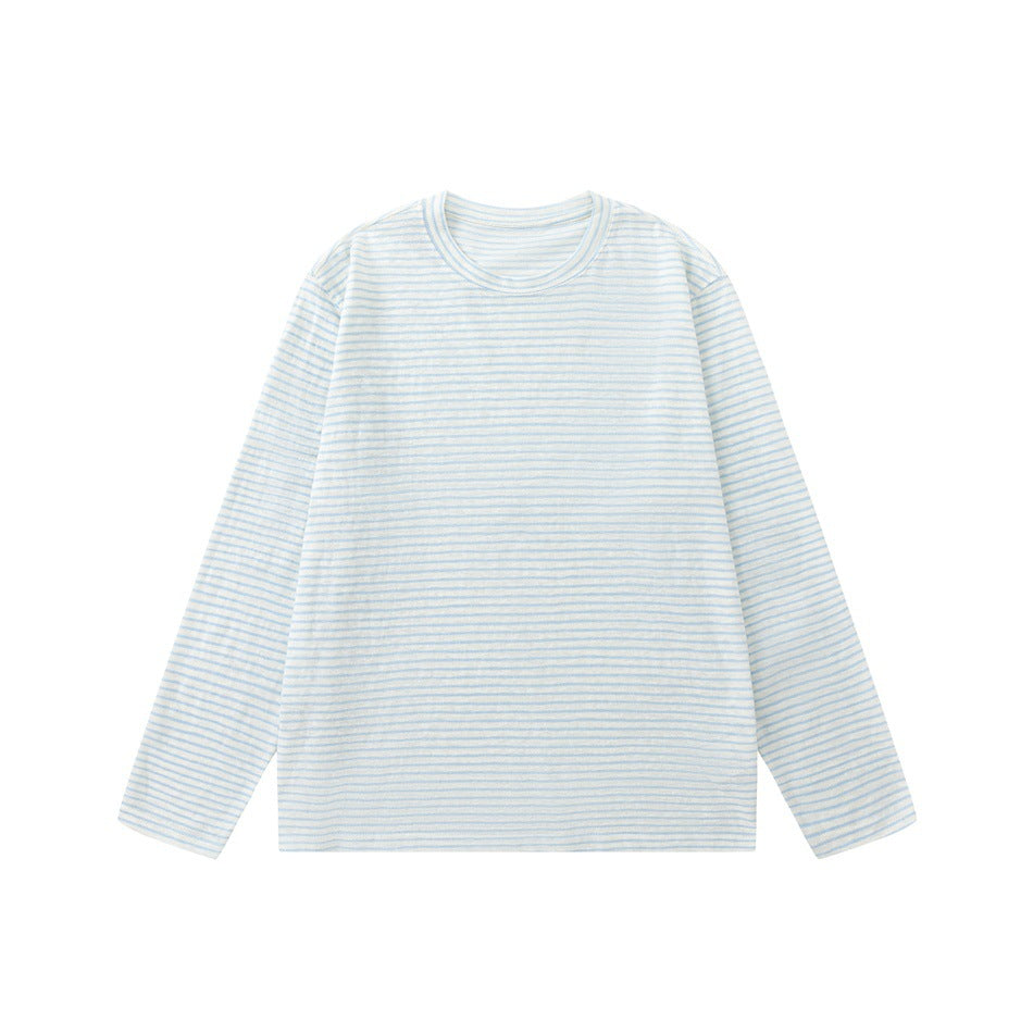 Front view of a long-sleeve crew-neck shirt with narrow pale blue stripes on cream.