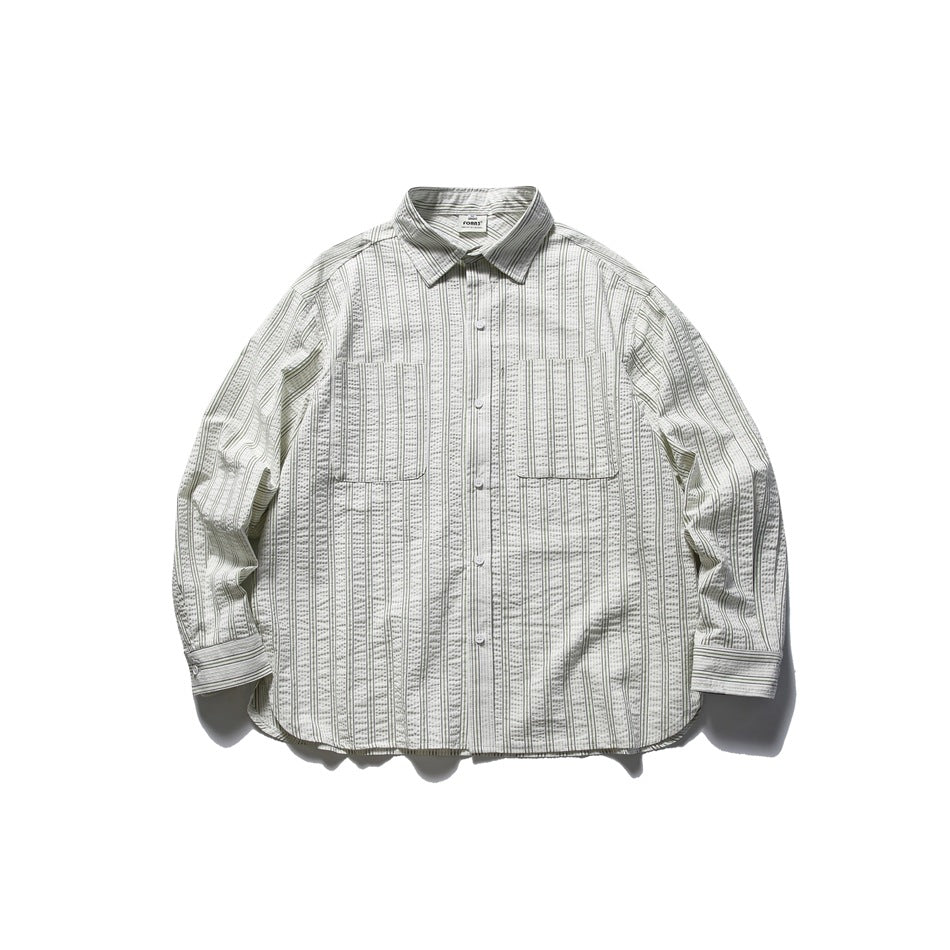 Front flat lay of an off-white striped seersucker-style long-sleeve shirt with chest pockets and button placket