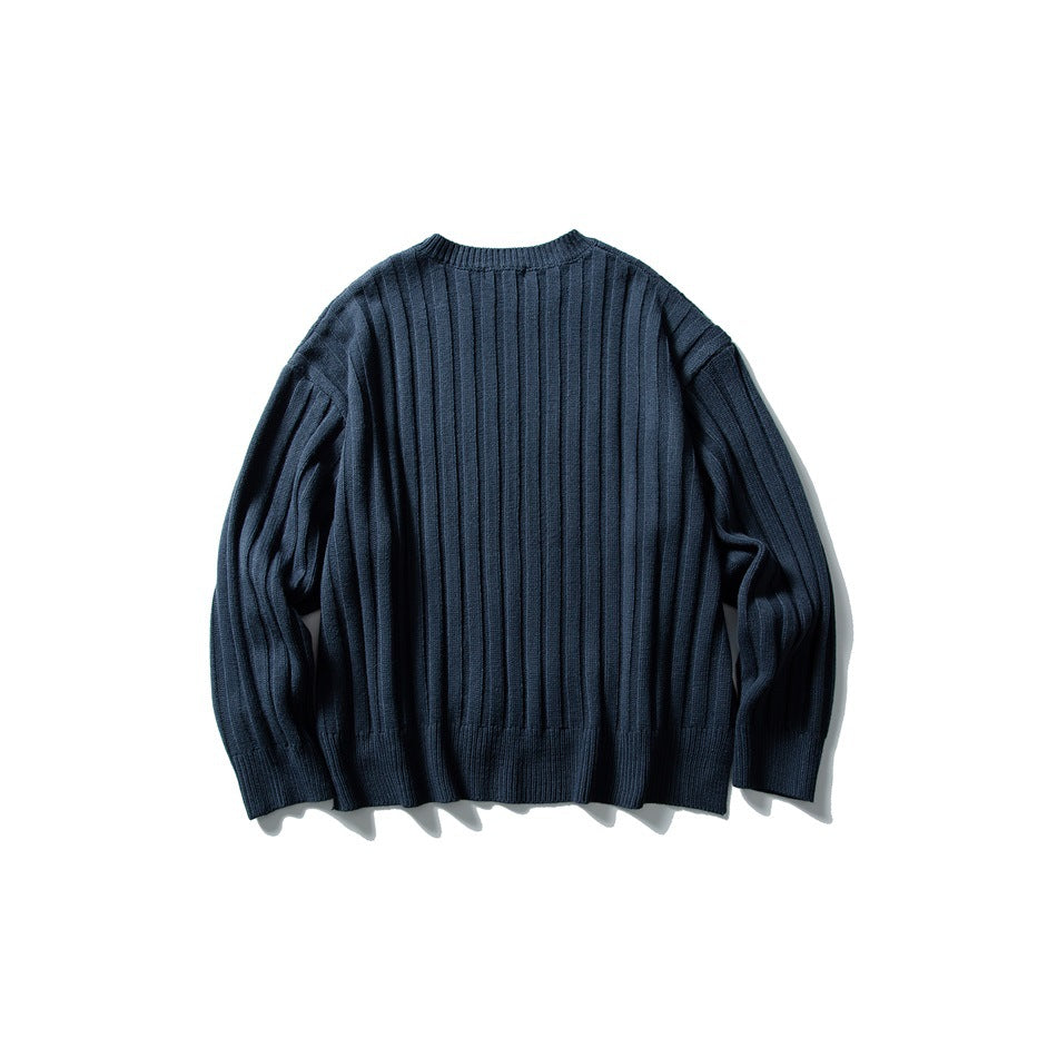 Navy rib-knit crewneck sweater shown from the back against a white background.