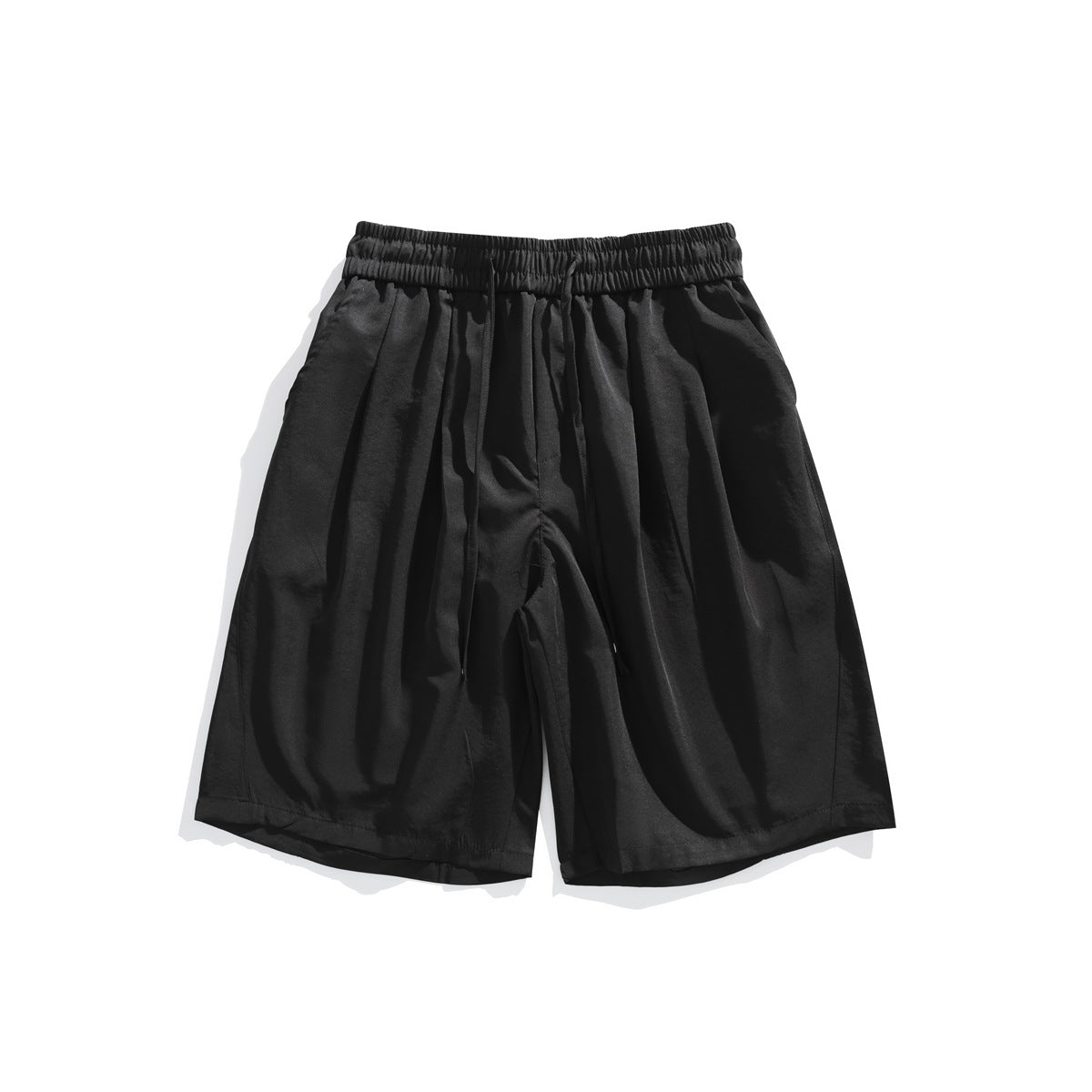 Black knee-length shorts with elastic drawstring waistband and front pleats, flat lay front view