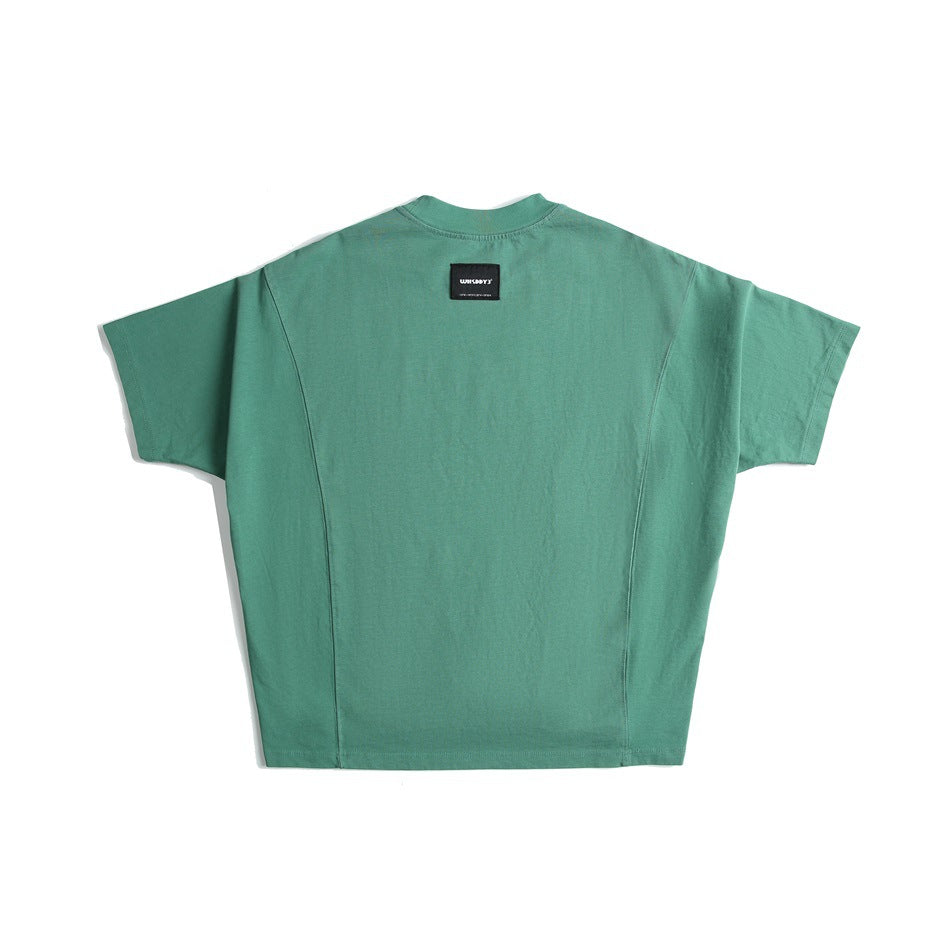 Green short-sleeve T-shirt back view with curved panel seams, high ribbed neck and small black label