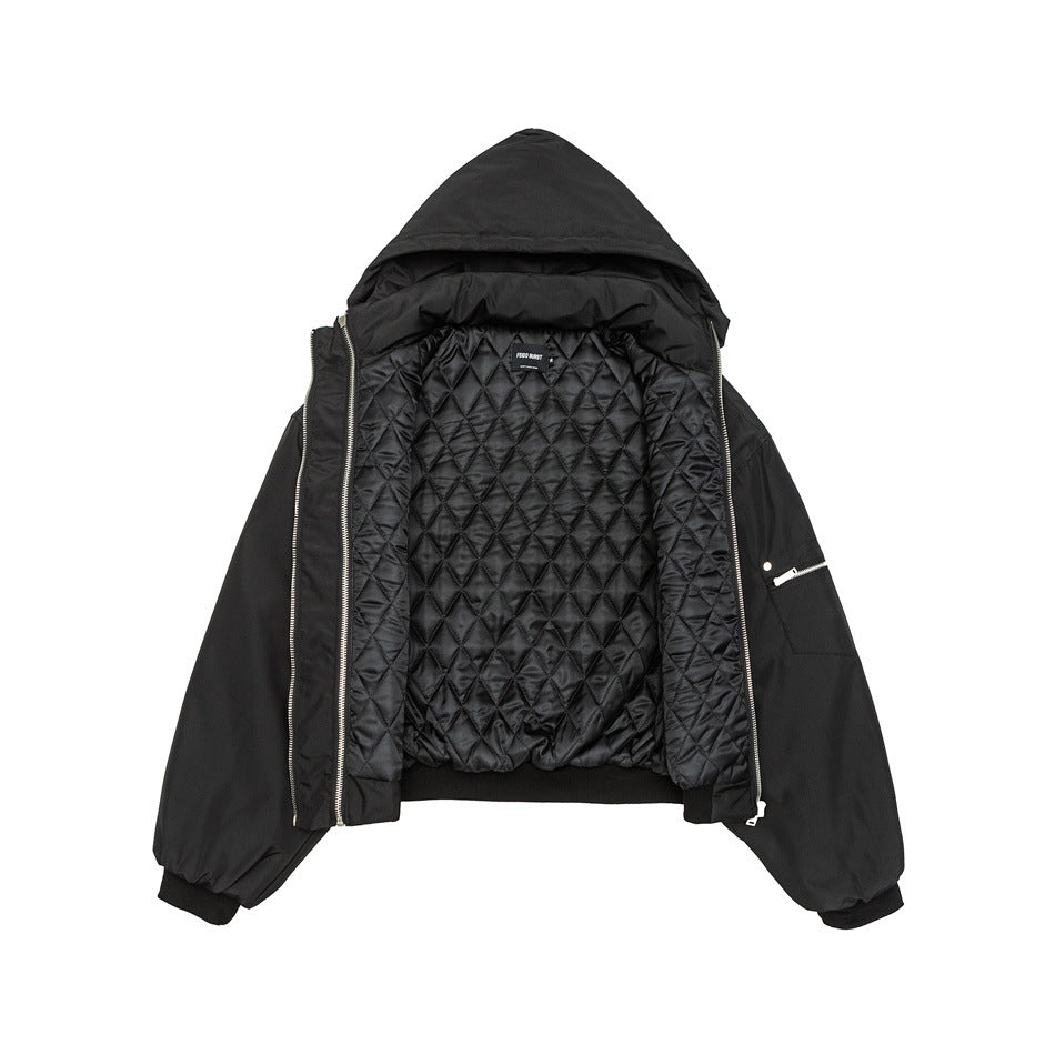 Open black hooded jacket showing diamond-quilted lining, front zippers, ribbed hem and sleeve zip pocket