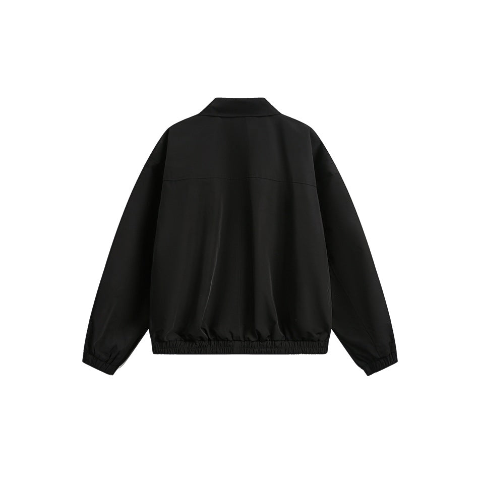 Back view of a black collared jacket with long sleeves and an elasticated hem.