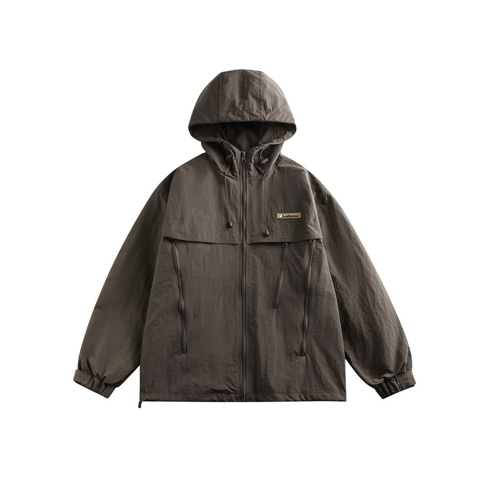 Dark gray hooded zip jacket flat lay with drawcord hood, chest panel, angled zip pockets and elastic cuffs