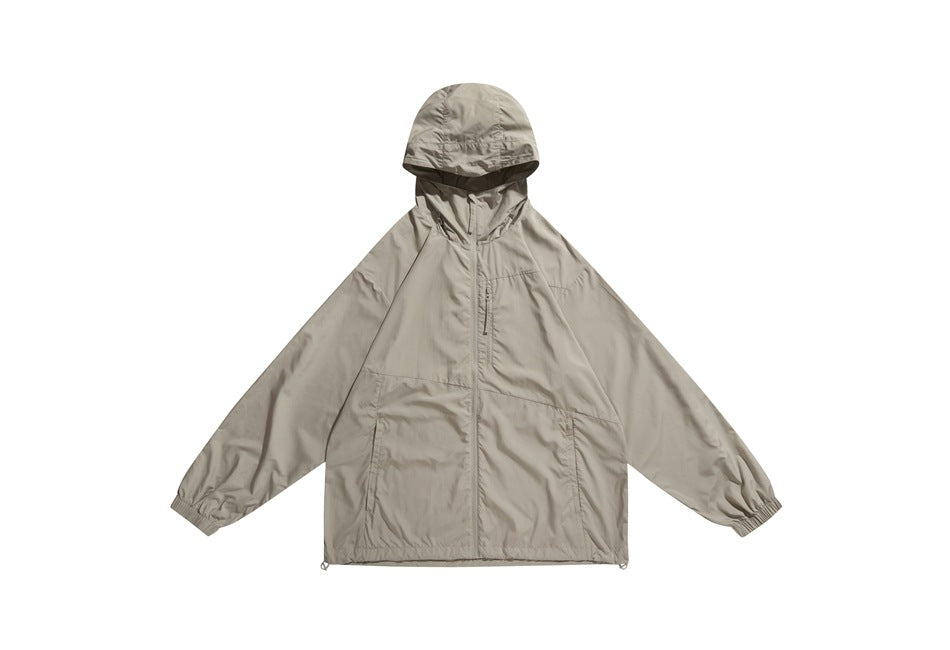 Front view of a taupe hooded jacket with a full zipper, two front pockets, and elastic cuffs, laid flat on white.